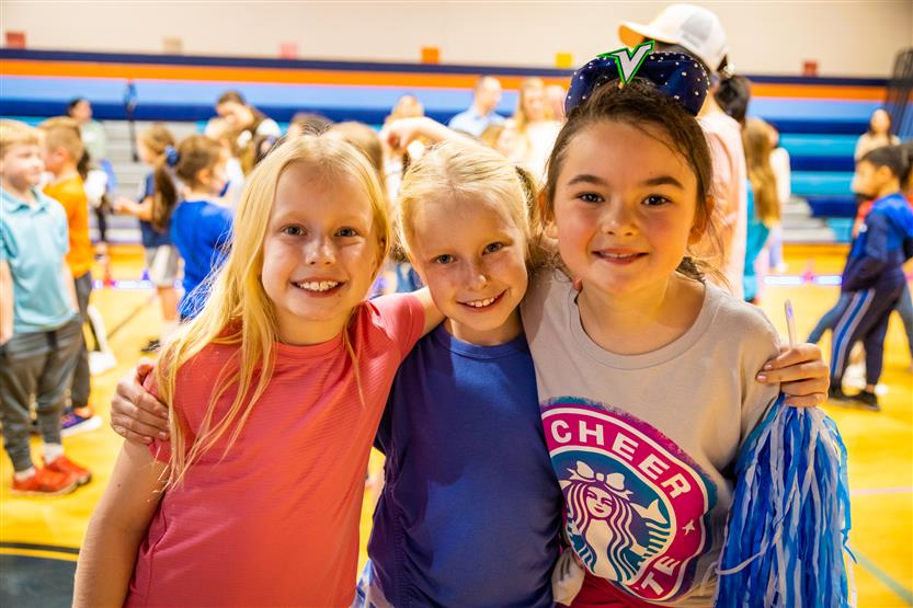 Students and families participate in a fun run